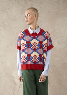 a male model in a red, white and blue sweater