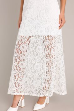 Show off all that Irresistible Charm in this darling maxi dress! Take in all the lace details and classic silhouette and know you've made the perfect choice! This dress features a high round neckline, a slip up the side, and a lace overlay with a lining that extends from the shoulder to the mid-thigh. 65% Cotton, 35% Nylon Hand Wash Cold Lined 100% Polyester Manufactured in China Designed in the USA Model is wearing a size x-small.