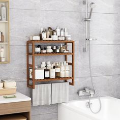 a bathroom with a shelf that has various items on it and a bathtub in the background