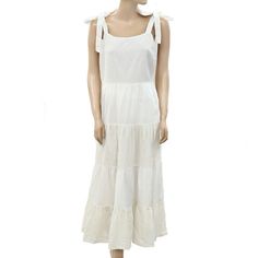 264756 Guaranteed 100% Authentic & Never Before Worn Description: Square Neck Sleeveless Ruffle & Tiered Detail Zipper On Side Measurements/Item Details Size - Medium Bust - 17"Across (Laying Flat) Waist - 15.5"Across (Laying Flat) Length - 51"Approx Color - White Fabric - Cotton Please Note: This Item Is New Without Tags, Labels & Wash Care. White Tiered Sleeveless Summer Dress, White Sleeveless Tiered Dress For Summer, White Tiered Sleeveless Dress For Summer, White Dress With Tie And Ruffled Straps, Sleeveless Linen Dress With Ruffle Hem, Sleeveless Linen Dress With Ruffles, Sleeveless Linen Maxi Dress With Ruffles, Off-white Ruffled Midi Dress For Beach, Off White Ruffled Midi Dress For Beach