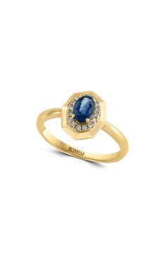 An oval-cut sapphire adds vibrant sparkle to this 14-karat yellow gold ring haloed by pavé diamonds. Total sapphire weight: 0.57ct. Total diamond weight: 0.08ct. Color: H–I Clarity: I1–I2 14k gold/sapphire/diamond Made in the USA Diamond Guide Pave Diamond Ring, Diamond Guide, Yellow Gold Ring, Keep Jewelry, Halo Rings, Anniversary Sale, Sapphire Diamond, Womens Jewelry Rings, Yellow Gold Rings