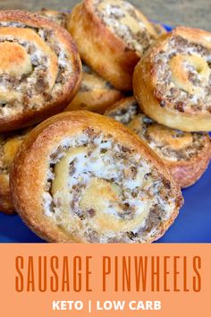 sausage pinwheels on a blue plate with text overlay that reads sausage pinwheels keto low carb