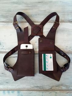 *This Holster is totally handmade and produced with genuine leather. *It is hand-sewed with long lasting strings. *You can set with the adjustable strap according to your body Phone bag dimensions : 9 X 14 cm (max. phone size must be 7.5 x 16 cm) Wallet bag dimensions : 9 x 12 cm Pola Jaket, Supraviețuire Camping, Sewing Hand, Tas Mini, Hand Style, Holster Bag, Leather Suspenders, Trendy Sewing, Leather Card Wallet