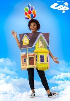 a woman is standing in the air with a house on her head and balloons above her head