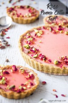 raspberry and pistachio tart with rose petals on top, ready to be eaten