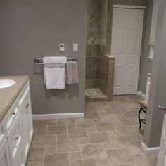 the bathroom is clean and ready to be used as a guest room or family room