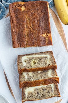 slices of banana bread sitting on top of a cutting board