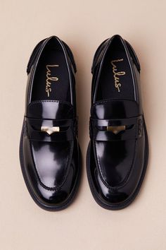 From class to the office, no one keeps things as chic as the Lulus Halliday Black Patent Penny Loafers! Sleek, faux patent leather shapes these timeless loafers that feature a rounded-toe upper, a notched collar, and a traditional cutout strap at the vamp with a coin-like medallion at the center. The simple slip-on design makes for effortless everyday styling. Available in whole sizes only. 1" rubber sole. Lightly cushioned insole. Rubber sole has nonskid markings. Man made materials. Imported. Black Patent Loafers, Patent Loafers, Flat Loafers, Patent Leather Loafers, The Vamps, Notched Collar, Penny Loafers, Leather Loafers, The Office