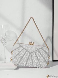 Bird in Bag - Elegant Pearl-Embellished Clutch Bag for Ladies: A Perfect Accessory for Evening Parties, Weddings, Proms, and Formal Events - Complete with Metal Chain Handle for Ease and Style. Complements Party Dresses, Formal Gowns, and Cocktail Attire. Pearl White Bridal Accessories For Party, Elegant Embellished Clutch For Banquet, White Rectangular Evening Bag For Banquet, Embellished Clutch For Banquet, Embellished Rectangular Clutch For Banquet, Embellished Rectangular Clutch For Banquets, Pearl White Rectangular Evening Bag For Party, Embellished Clutch Bags For Prom, Glamorous Embellished Bags For Prom