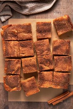 cinnamon sugar bars cut into squares on a cutting board