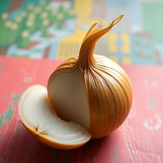 an onion cut in half sitting on top of a table