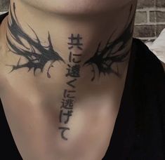 a woman with a dragon tattoo on her neck