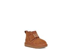 UGG Kids Neumel Graphic (Toddler/Little Kid) - Boy's Shoes : Chestnut : Pamper your young one's feet with UGG Kids Neumel Graphic boots. The slip-on style boots have hook-and-loop closure for a secure fit while the ankle pull tab offers convenience for donning and doffing. They have an elastic strap with UGG graphic that adds to the authenticity of the shoes. Cow suede upper. 17mm UGGplush upcycled wool and lyocell lining. Foam footbed. 17mm UGGplush upcycled wool and lyocell midsole. Treadlite by UGG outsole provides increased traction, durability, cushioning and flexibility. Imported. Graphic Boots, Ugg Kids, Kids Uggs, Style Boots, Free Kids, Pull Tab, Boys Shoes, Chestnut