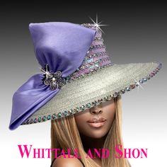 The square crown of the hat strikes a polished look. It is embellished with a feast of jewels that add a touch of glamour and opulence. A focal point of this hat is a large bow that elegantly rests over the right eye. Within the bow's embrace, two crystal-laden flowers are nestled delicately. Lady Diva, Unusual Hats, Church Lady Hats, Ladies Dress Hats, Purple Wig, Church Hat, Orange And Gold, Elegant Hats, Kentucky Derby Hats