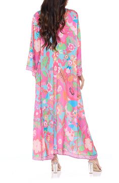 Go from beach to boardwalk in a flowery border-print cover-up wrap with a front-tie closure for easy layering. 54" length Shawl collar Long sleeves 100% polyester Hand wash, dry flat Imported Floral Duster, Border Print, Women Men Shoes, Spring Trends, Swimwear Cover, Mens Spring, Bridal Shop, Shawl Collar, Shawl