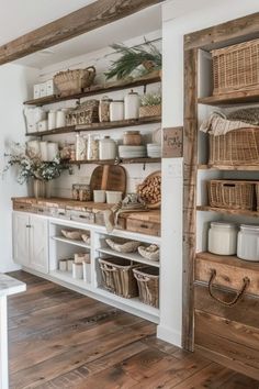 the shelves in this kitchen are filled with baskets and wicker baskets, along with other items