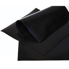 black sheets are stacked on top of each other