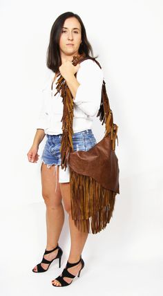 Western Fringe hobo bag - brown leather bohemian bag, Western shoulder bag, Bohemian Women bag, Western fringe purse This cross body bag is the perfect size to carry your daily essentials in style! It is made from high quality leather. This leather bag is a perfect everyday bag! There is a lot of space and you can put there everything in your everyday life. * Top zipper closure * Outer slip pocket on the back * Includes internal pockets for mobile phone and other small items. Important note: The Boho Leather Purse, Unique Leather Bag, Boho Leather Bags, Recycled Jeans Bag, Bohemian Women, Fringe Purse, Bohemian Bags, Fringe Bags, Recycled Jeans