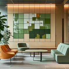 an office lobby with green and orange furniture