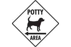 a black and white sign that says potty area with a dog in the center