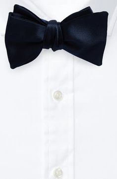 The label's impeccable attention to detail is displayed in this classically handsome bow tie hand-stitched from pure silk by Italian artisans. 100% silk Dry clean Made in Italy Classic Pre-tied Satin Bow Tie, Classic Pre-tied Bow Tie, Classic Pre-tied Bow With Ties, Classic Pre-tied Decorative Bow, Classic Pre-tied Bow, Classic Satin Business Suit And Tie Accessories, Classic Pre-tied Tie With Decorative Bow, Classic Pre-tied Satin Bow, Classic Bow Tie For Wedding