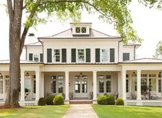 a large white house with lots of windows