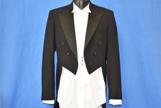 "Chest in. Length in. Sleeve in. Tag Says: After Six, 36 regular (jacket) Jacket Size: 36 Waist Size: 30 Content: Wool Blend Tag Brand: After Six This vintage tuxedo features a stylish long tail coat with three buttons going down each side. The tuxedo jacket has satin facing on the lapels and includes a single chest pocket. The back of the jacket meanwhile features a fun joke. The black jacket is printed with yellow lettering which reads, \"Mo's Tuxedo Rentals\" in what appears to be spray paint Semi-formal Tuxedo Outerwear With Pockets, Fitted Long Sleeve Suits With Pockets, Fitted Long Sleeve Tuxedo With Pockets, Classic Black Tuxedo With Pockets, Formal Fitted Full-length Outerwear, Fitted Full-length Formal Outerwear, Fitted Semi-formal Outerwear With Pockets, Elegant Full-length Outerwear With Pockets, Fitted Full Length Fall Suits