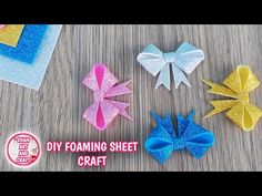 four different types of bows are shown on a wooden surface with the words diy foaming sheet craft