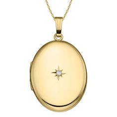 This oval gold filled locket is a perfect gift for anyone special in your life. Elegant with a genuine diamond in the center. This locket is packaged with a 14K gold filled rope chain that is 20" long. Made in the USA with a lifetime warranty. (20x25mm) Luxury Oval Pendant Locket Necklace, Classic Oval Locket Necklace Stamped 14k, Classic Gold Oval Locket Necklace, Classic Yellow Gold Oval Locket Necklace, Yellow Gold Oval Locket Necklace For Anniversary, Oval 14k Yellow Gold Locket Necklace, Classic Oval Locket Necklace For Keepsake, Yellow Gold Oval Locket Necklace, Classic Oval Locket Necklace