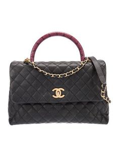 Chanel Top Handle BagFrom the 2018-2019 Collection by Karl LagerfeldBlackInterlocking CC Logo, Caviar Leather, Quilted Pattern & Chain-Link AccentGold-Tone HardwareRolled Handle & Chain-Link Shoulder StrapChain-Link Accents & Single Exterior PocketLeather LiningTurn-Lock, Flap & Snap Closures at Front Chanel Top Handle, Chanel Top, Coco Handle, Quilted Pattern, Cc Logo, Handle Bag, Cross Body Handbags, Chain Link, Top Handle