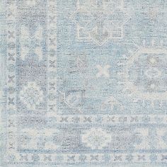 an area rug with blue and white colors