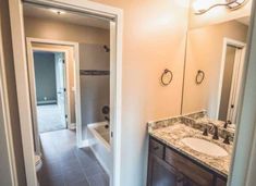 the bathroom is clean and ready to be used as a guest room or family room