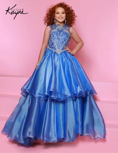 The Sugar Kayne C352 Girls Pageant Dress is a stunning choice for your little one. Crafted with a beaded bodice and layered metallic organza, this dress is sure to make your preteen dazzle on stage. A timeless choice for her big moment. Embrace the fairytale elegance in this ballgown — the beaded bodice and enchanting Pageant Outfits, Johnathan Kayne, Mnm Couture, Jasz Couture, Girls Pageant Dresses, Fabric Combinations, Beaded Bodice, Pageant Dress, Pageant Dresses