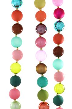 a multicolored beaded necklace on a white background