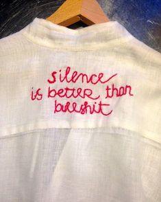 a white shirt with red writing on it that says, science is better than breast