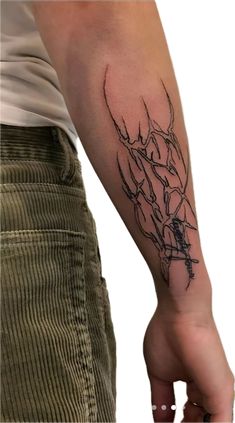 a person with a tattoo on their arm