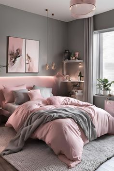 a bedroom with pink and grey decor