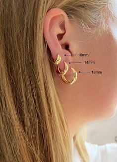 These 14k gold filled hoop earrings are great for everyday wear. They look perfect on their own or stacked with other earrings DETAILS - 14k gold filled hoop earrings come in three sizes:     -18mm (outer diameter)x 4mm thickness     -14mm (outer diameter) x4mm     -10mm (outer diameter)x 3mm - sold as pair - Hypoallergenic, lead free, nickle free - Comes beautifully packaged ready for gift giving PRODUCTION AND SHIPPING - We offer FREE WORLD WIDE shipping  - Every piece is handmade to order in our little studio in Melbourne, Australia - We aim to ship your order in 1-2 business days - Estimated domestic (Australia) shipping times: 10-15 business days - Estimated international shipping times: 15-25 business days WHAT IS GOLD FILLED Gold filled is the closest alternative to solid gold. It i Dainty Small Hoop Stackable Earrings, Dainty Stackable Hoop Earrings, Dainty Stackable Small Hoop Earrings, 14k Gold Small Hoop Stackable Earrings, 14k Gold Stackable Hoop Earrings As Gift, Gold Stackable Earrings For Gift, Small 14k Gold Stackable Hoop Earrings, Stackable Huggie Hoop Earrings In Yellow Gold, Stackable 14k Gold Hoop Earrings As Gift