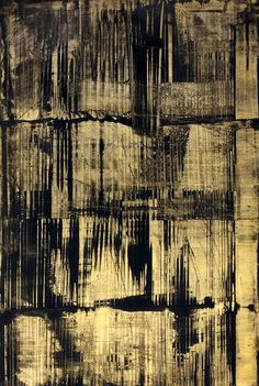 an abstract painting with black and yellow paint on the wall, in shades of brown