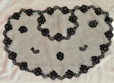 This is a lovely vintage head covering or scarf measuring 28" x 20" and made of black netting inset with lace roses.  It dates to the early to mid 20th century and is in excellent condition Black Rose Shawl, Black Vintage Scarf One Size, Floral Scarf, Head Covering, Head Scarf, Black Lace, Vintage Black, Scarf Wrap, Scarf Accessory