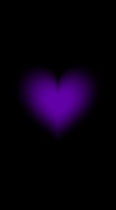 a purple heart on a black background