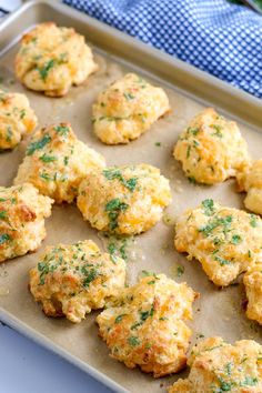 some food that is sitting on a baking sheet in the oven and ready to be eaten