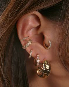 Sleek in design, the Oda earrings curves in effortlessly. It has a gentle yet daring geometric edge to it, worn best with a top bun for maximal shimmer Gold Earring Cuff, Earring Stacks, Earring Cuff, Stacked Earrings, Stylish Bracelet, Jewelry Fashion Trends, Jewelry Essentials, Latest Jewellery, Gold Earring