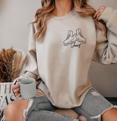 Custom Ice Skating Sweatshirt, Personalized Ice Skater Shirt, Figure Skating Hoodie, Floral Ice Skate Hoodie, Cute Ice Skating Gifts,R277 ♥️ WELCOME ♥️ Looking for super soft, comfy, and high-quality clothes for your special days or loved ones? You've come to the right place! We absolutely love what we do and are dedicated to making your shopping experience just perfect. If you have any questions about our products, don't hesitate to reach out. We're here to help and will get back to you as soon as possible! 🔵 HOW TO ORDER  1️⃣Select the t-shirt size 2️⃣ Select the color 3️⃣ If you have, add your personalized designs, enter customization in "Add your personalization" field 4️⃣ Add to cart 5️⃣ Go back and Repeat for each size (to create a set ) ♻️ CARE INSTRUCTIONS  🟢 Wash item inside out Ice Skating Gifts, Skate Hoodie, Floral Ice, Skater Shirts, Ice Skater, Hoodie Cute, Ice Skaters, Ice Skate, Ice Skating