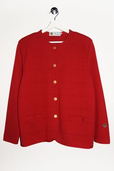 Embrace timeless elegance with this Vintage Busnel Cardigan. Crafted in France from luxurious red wool, this 80s/90s button-up blazer exudes chic sophistication. Featuring a stylish checkered vest, it's a rare find for fashion enthusiasts. Perfect for adding a touch of retro charm to any wardrobe! - Size tag:  Women's M. - Measurements (laying flat): Please always check measurements before buying. Pit to Pit: 20.5" Length: 26" Sleeve: 23.5" Pit to Cuff: 16" Across the Shoulders: 16.5" -Wear: /Pl Classic Red Buttoned Cardigan, Classic Red Cardigan With Buttons, Vintage Long Sleeve Formal Cardigan, Elegant Red Cardigan With Buttons, Vintage Workwear Sweater With Button Closure, Vintage Cardigan With Button Closure For Work, Vintage Button Closure Cardigan For Work, Vintage Sweater With Button Closure For Work, Vintage Buttoned Cardigan For Work