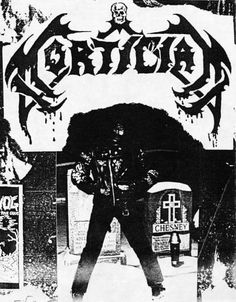 a black and white photo of a man standing in front of a sign with the word critica on it