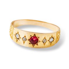 We will always be suckers for etched starbust settings and the pearl/ruby combination is really the icing on the cake for this sweet little ring. Solid 14k Yellow GoldSize 81 Center Ruby cabochon2 Salt-n-Pepper Diamonds2 Pearls ﻿ Build your own ring stack with any of our rings, from vintage estate rings to diamonds and dainty stacking rings, we've hand selected the best styles for ease of styling with anything and everything. Luxury Engraved Ruby Ring For Engagement, Vintage Ruby Ring Band, Luxury Engraved Ruby Jewelry, Luxury Ruby Ring Stamped 925, Luxury Heirloom Ruby Ring As Gift, Luxury Engraved Ruby Promise Ring, Vintage Ruby Birthstone Ring, Luxury Ruby Ring Stamped 925 As A Gift, Luxury Stamped 925 Ruby Rings