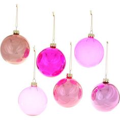 six pink and purple ornaments hanging from hooks