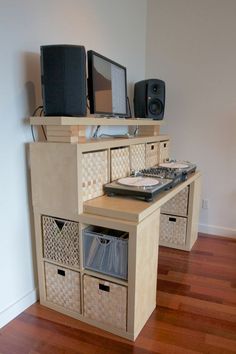 an image of a computer desk with speakers