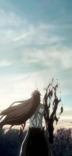 a woman with long hair standing in front of a sky filled with clouds and birds